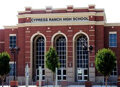 the front entrance to cypress ranch high school, which is located in an old brick building