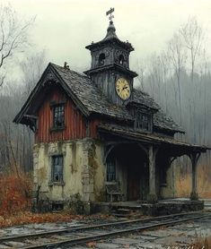 an old abandoned train station with a clock on the roof and steeple above it