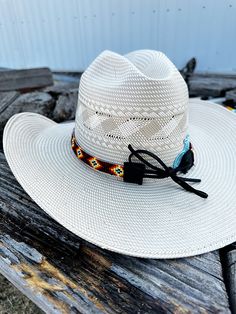 This beaded hat band will bring to your western look. Featuring bright, intricate beading, this hat band will bring a pop of color and texture to your wardrobe. Make a statement with this unique accessory. - The Beaded Portion of the hat band is 20 inches - The leather adds a extra 13 inches. The leather ties makes the hat band adjustable to your own hat. - The length of the entire band is 32 1/2 inches. (Hat is not included) ( These hat bands take 3-4 weeks depending on the orders that might be Aztec Hat, Beaded Hat Bands, Beaded Work, Intricate Beading, Beaded Hat, Western Look, Missions Trip, Leather Work, Hat Band