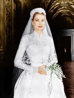 an old photo of a woman in a wedding dress