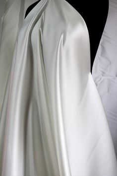 Cream Silk Fabric For Wedding, Elegant Satin Fabric For Wedding, Elegant Wedding Satin Fabric, Elegant Satin Finish Fabric For Wedding, White Satin Finish Fitted Gown, Elegant Wedding Fabric With Satin Finish, Elegant Cream Fabric For Wedding, White Satin Finish Wedding Gown, Wedding Silk Fabric With Satin Finish