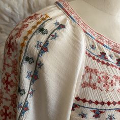 Gorgeous American Eagle Long Sleeve Boho Tunic Top Front Pull Strings With Tassel Embroidered Multicolor Detail Around Chest And Arm Sleeve Beautiful Tones Nwot Size Medium Spring Folk Style Embroidered Top With Motif, Floral Embroidered Patterned Blouse For Summer, Casual Spring Tops With Motif, Casual Tops With Multicolor Embroidery And Motif, Casual Peasant Top With Multicolor Embroidery For Spring, Casual Multicolor Embroidered Peasant Top For Spring, Bohemian Spring Top With Motif, Bohemian Tops With Motif For Spring, Bohemian Motif Tops For Spring