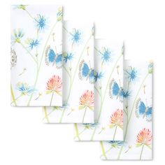 four napkins with blue and pink flowers on them