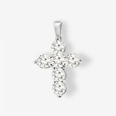 This generously sized cross pendant features 1.85 carats of natural diamonds, cut to the highest standards and set in brilliant white gold to make the diamonds shine their brightest. Let your faith be seen with this stunning heirloom quality piece. Pair this with any of the devotional pieces in our Religious Collection. Natural Diamonds: 1.85ctw 14K White Gold Length: 1 Inch (Chain not included) Luxury White Gold Cross Necklace For Anniversary, Luxury Diamond Cross Necklace For Anniversary, Luxury Diamond White Cross Necklace For Formal Occasions, Luxury Diamond White Brilliant Cut Cross Necklace, Luxury White Diamond Accents Cross Necklace, Luxury Classic Diamond White Cross Necklace, Luxury Silver Cross Diamond Necklace, Luxury Diamond White Cross Jewelry, Luxury Diamond Cross Pendant Necklace For Anniversary