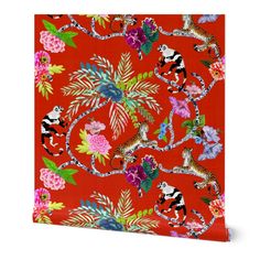 an animal and flowers pattern on red fabric