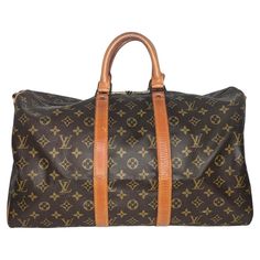 This stylish duffel is crafted of monogram coated canvas with vachetta leather wrap around detailing and rolled top handles with brass hardware. The top zippers open to a cocoa brown fabric interior. Est. Retail $1,420 Designer: Louis Vuitton Material: Monogram canvas; cowhide leather Date/Authenticity Code: V.I. 862 Production Year: February 1986 in France Measurements: 17.7"W x 10.6"H x 7.9"D Drop: 4" Closure/Opening: 2-way zip Interior Lining: Canvas Hardware: Gold-tone Brass Includes: Leather ID tag and Entrupy COA Condition: Very Good pre-owned vintage condition; exterior canvas is all intact with faint scuffs, shape has relaxed due to storing, patina at handles and trim, minor tarnishing at hardware; minor residue at interior. Favorite Purse, Cocoa Brown, Brown Fabric, Vintage Louis Vuitton, Leather Wraps, Brass Hardware, Duffel Bag, Monogram Canvas, Fashion Handbags