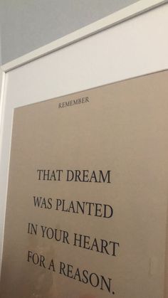 a sign that reads, that dream was planted in your heart for a reason on the wall