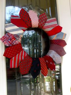 a wreath made out of ties on the front door