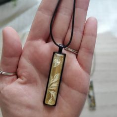 "Discover the perfect fusion of artistry and fashion with this Long Rectangle Pendant Necklace!  Elevate your style, captivate attention, and make a statement that's uniquely you. 🎨 This pendant tells a story through its abstract and colorful mixed media design. Crafted by a skilled artist, this pendant is truly one of a kind. 🌼 This necklace is more than an accessory; it's a reflection of your personality. Add an artistic touch of wearable art to your every day.  🎁 This necklace could be a perfect gift for a woman in your life who appreciate creativity, uniqueness, and quality. Product Details: ✨ Materials: This pendant feature an abstract, colorful mixed media design sealed with a clear glass cabochon dome, preserving the intricate design while adding a captivating 3D effect. ✨ Chain: Black Jewelry With Artistic Design As Gift, Adjustable Oblong Jewelry As A Gift, Black Wearable Art Jewelry As Gift, Black Wearable Art Jewelry Gift, Multicolor Square Jewelry Gift, Multicolor Square Jewelry For Gifts, Handmade Adjustable Necklace With Rectangular Pendant, Adjustable Necklace With Rectangular Pendant, Handmade Adjustable Rectangular Necklace