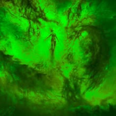 a person standing in the middle of a green vortex