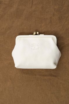 Front view of Coin Purse in Milk Everyday Pouch Coin Purse With Snap Closure, Snap Closure Pouch Coin Purse, Classic White Wallets For Daily Use, Compact Beige Coin Purse For Daily Use, Elegant White Coin Purse For Everyday, Everyday Snap Closure Coin Purse, Classic Everyday Coin Purse With Smooth Grain, Beige Travel Coin Purse With Coin Pocket, Bifold Coin Purse With Snap Closure As Gift