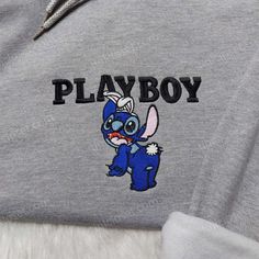 The Stitch Playboy Embroidered Shirt is a playful and stylish addition to your wardrobe. Made from high-quality cotton, it features an intricate embroidery of the mischievous Stitch character from Disney. With its soft and comfortable fabric, this shirt is perfect for casual outings or lounging at home. Its unique design and attention to detail make it a standout piece that will surely turn heads. Get ready to showcase your love for Disney and add a touch of fun to your everyday look with this i