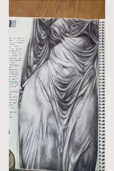 a pencil drawing of a woman's torso