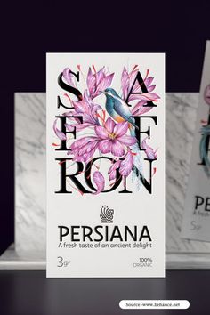 the packaging for persana is displayed on a table with marble and pink flowers