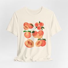 Whether you're strolling through a orchard or simply want to add a touch of elegance to your look, our Peach Vintage Shirts are the perfect choice. Embrace the beauty of timeless style with these lovely shirts that bring a hint of vintage charm to your wardrobe! HOW TO ORDER YOUR T-SHIRT: *Select the shirt color type and size using the drop-down menu *Once all your desired items are in your cart, please complete your order by entering your payment method, desired shipping address and click submi Spring Peach Crew Neck T-shirt, Trendy Peach Relaxed Fit T-shirt, Trendy Relaxed Fit Peach T-shirt, Spring Peach Graphic Print T-shirt, Peach Graphic Print T-shirt For Spring, Spring Peach T-shirt With Graphic Print, Summer Peach T-shirt With Graphic Print, Heather Peach Graphic Print T-shirt For Summer, Heather Peach T-shirt With Graphic Print For Summer