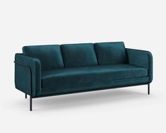 a blue couch with black legs on a white background