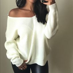 Our Favorite Sweater For The Long Awaited "Sweater Weather". This Gorgeous Top With A Twist Back Detail Is A Must. Ivory Twist Back Detail Can Be Worn Off-The-Shoulder Model Is Wearing A Size Small Winter White V-neck Sweater For Fall, Cozy Cream V-neck Sweater For Winter, Trendy White V-neck Sweater For Winter, White Chunky Knit V-neck Top, Winter White V-neck Sweater For Winter, Winter White V-neck Sweater, Trendy V-neck Sweater In Winter White, White Chunky Knit V-neck Sweater With Long Sleeves, Cozy Winter White V-neck Tops