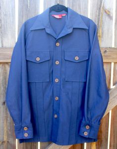 Excellent Condition 1970s Dickies Work Shirt. 100% Polyester. Size listed on the tag says 38 but fits a Small mens. Size : Small Front Length : 23 Back Length : 29 Chest : 20 Shoulders : 17 Sleeve : 25 * All measurements were done laying flat * 70s Shirts Men, Retro Cotton Shirt With Snap Buttons, 1970s Style Long Sleeve Cotton Shirt, 1970s Fitted Cotton Shirt, 1970s Long Sleeve Cotton Shirt, 1970s Style Cotton Tops For Fall, 1970s Cotton Tops For Fall, Utilitarian Fashion, Dickies Work Shirt