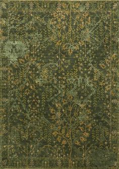 an area rug with green and gold colors