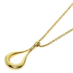 TIFFANY & Co. 18K Gold Elsa Peretti Open Teardrop Pendant Necklace Metal: 18K Yellow Gold Chain: 16" long Pendant: 17.5mm long x 7.5mm wide  Hallmark: TIFFANY&CO. 750 PERETTI SPAIN" on chain tags Condition: Excellent condition  Authenticity guaranteed Luxury Gold Briolette Drop Necklace, Luxury Yellow Gold Long Drop Necklace, Formal Drop Necklace With Polished Finish, Classic Drop Necklace In Yellow Gold, Luxury Long Drop Yellow Gold Necklace, Formal Yellow Gold Drop Necklace, Elegant Yellow Gold Teardrop Pendant Necklace, Luxury Yellow Gold Briolette Drop Necklace, Luxury Yellow Gold Drop Necklaces