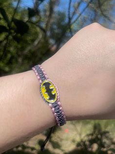 Set a fun tone for your relationship with these handmade Batman matching couples’ bracelets! Crafted with care, these accessories are perfect for couples who share a love for the Caped Crusader! Show your commitment to each other and your fandom with these unique Batman Neon Friendship Bracelets! #dynamicduo ☆ We work as quickly as possible to create your bracelets. However, since each order is handmade to order it can take 7-10 business days for your order to be shipped. (This does not include Handmade Themed Wristband For Gift, Handmade Themed Wristband Gift, Themed Handmade Wristband For Gift, Adjustable Fandom Bracelets As Gift, Customized Novelty Friendship Bracelets As Gift, Handmade Themed Wristband, Themed Handmade Wristband, Adjustable Beaded Bracelets For Fandom Gifts, Handmade Themed Friendship Bracelets