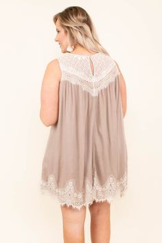 This dress is STUNNING! The latte color is so gorgeous and the lace detail at the shoulder and hem adds a feminine, romantic touch that's super stylish right now! Plus, the loose, breezy cut just secures the fact that this beauty was made for summer! Style this beauty with some fun wedges or peep-toe booties for an ultra-trendy look! Flowy Beige Lace Mini Dress, Beige Summer Dress With Lace Collar, Flowy Beige Dress With Lace Patchwork, Beige Summer Dresses With Lace Collar, Flowy Beige Dresses With Lace Patchwork, Beige Lace Mini Dress With Patchwork, Beige Lace Mini Dress With Lace Patchwork, Beige Scalloped Lace Dress For Summer, Sleeveless Lace Dress With Crochet Trim