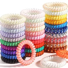 ?Best Hair Ties Material?The hair coils are made of Soft sturdy and durable thermoplastic polyurethane which no pungent smell and no metal,The spiral hair ties are gentle on your hair,the smooth plastic,spiral design will prevent tanlging and prevents hair breakage when you remove them. ?Mighty Hair Elastic and resilience? The diameter of elastic hair ties are 1.97 inches and 2.17 inches in diameter, but don't be deceived by its size!DED coils hair bands stretch freely and copiously to longer size to hold up all of your hair in a ponytail,messy bun or braid hairstyle.and also can be worn on your wrist as a hair bracelet when not in use.Give zest to your fashion hairstyle and lifestyle. ?Waterproof Hair Ties for Women Girls?Phone coil hair ties are non absorbent, no nasty wet feeling when y No Crease Hair Ties, Coil Hair Ties, Spiral Hair Ties, Best Hair Ties, Ponytail Messy, Thinning Thick Hair, Twisted Hair, Hair Bracelet, Hair Tie Bracelet