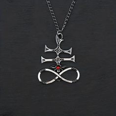 Stylish Gothic Symbol Pendant Design Made Of High-Quality Materials For Durability And Long-Lasting Wear Perfect Accessory For Parties, Holidays, And Special Occasions Adds A Touch Of Edgy Style To Any Outfit Makes A Great Gift For Any Fashion-Forward Person In In Your Life Pendant Design, Edgy Fashion, Womens Jewelry Necklace, Special Occasion, Fashion Forward, Great Gifts, Jewelry Necklaces, Women Jewelry, Pendant Necklace