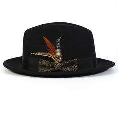 Unveil a new level of elegance with our Black/Khaki with Matching Grossgrain Ribbon 2 1/2" Wool Felt Fedora Hat from the Spectara Collection. This impeccably designed hat is crafted from top-tier wool, promising both comfort and long-lasting wear. Its bold black shade provides a versatile foundation, while the feather accent offers a splash of vibrant color. Wrapped with a textured ribbon that adds an extra layer of sophistication, this hat is a quintessential piece for any fashion-forward wardr Black Gold Silver Hat/fasanater For Wedding, Happy Hat, Black Fedora, Hat Size Chart, Felt Fedora, Crown Design, Black Shade, Timeless Accessories, Black Khakis