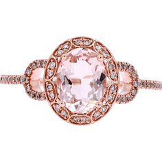 Captivating and elegant, this 14K Rose Gold Oval Morganite Ring is a masterpiece of fine jewelry craftsmanship. The soft, blush hues of the oval-cut morganite at the center, weighing a perfect 1.00 carat, are beautifully complemented by the warm glow of the 14K rose gold setting. Surrounding this exquisite gemstone are delicate, sparkling diamonds, adding a total of 0.20 carats of brilliance to the piece. These diamonds are intricately set in a halo around the morganite and along the band, creat Luxury Oval Rose Gold Diamond Ring, Oval Morganite Jewelry In Pink Gold, Oval Morganite Wedding Ring With Rose Cut Diamonds, Oval Morganite Ring In Pink Gold, Oval Morganite Rings In Pink Gold, Luxury Pink Oval Halo Ring, Elegant Blush Ring With Center Stone, Pink Gold Morganite Oval Ring, Oval Rose Gold Rings With Diamond Accents