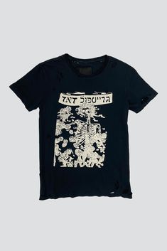 Distressed Black Dead T-Shirt from Assembly New York. Hebrew writing across top and bootleg Dead image on front. Please note each piece has been hand-distressed and effect may vary between individual garments. Email shop@assemblynewyork.com if you have any questions. - 100% Cotton - Made in USA - Mason is 6'3 with a 30" waist, shown in size XL MEASUREMENTS IN INCHES S M L XL BODY LENGTH 27.5 28.5 29.5 30.5 BODY WIDTH 18 20 22 24 Edgy Distressed Crew Neck T-shirt, Black Ripped T-shirt For Streetwear, Alternative Black Distressed T-shirt, Distressed Punk T-shirt, Edgy Washed Black Screen Print T-shirt, Distressed Black T-shirt For Alternative Fashion, Edgy Washed Black T-shirt With Screen Print, Black Distressed T-shirt For Alternative Fashion, Washed Black Grunge Tops With Graphic Design