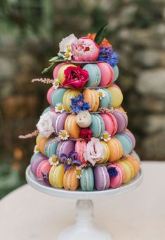 macaroons are stacked on top of each other in the shape of a tower