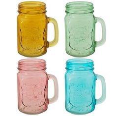 four different colored mason jars with lids