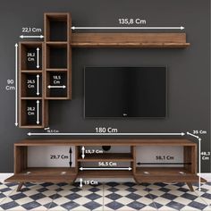 an entertainment center is shown with measurements for the tv and shelf space in front of it