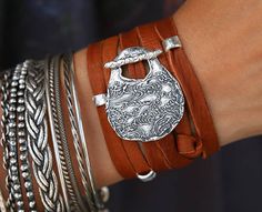 Boho Leather Wrap Bracelet: This supple leather bracelet wraps around your wrist about 5 times, and cleverly fastens with a handmade sterling silver toggle clasp. A few silver accent beads can be slid on top to add some extra sparkle. >>> This ONE 5X Leather Wrap bracelet ships in 2-3 business days <<< This unique HappyGoLicky original boho wrap bracelet is completely adjustable, so one size fits all. Simply tie a knot or two to alter the length for a perfect custom fit. The knots offer great te Waves Jewelry, Sea Turtle Jewelry, Silver Boho Jewelry, Silk Wrap Bracelets, Farmhouse Beads, Wave Jewelry, Wooden Farmhouse, Tie A Knot, Nautical Bracelet