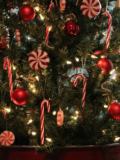 a christmas tree decorated with candy canes and ornaments