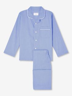 Crafted to keep them looking their best, whether it be for winding down before bed or for breakfast around the table in the morning - we've kept things simple for our kids' pyjamas, with a smart, rounded collar with revers, one breast pocket and plain hems on the sleeves. The pyjama top is fastened with buttons and piped in complementary white, while the trousers have an elasticated waist for ease and comfort. A firm favourite of our customers for its breathability, lightweight properties and lu Classic Blue Sleepwear For Bedtime, Blue Classic Sleepwear For Pajama Party, Classic Blue Sleepwear For Pajama Party, Pajama Top, Kids Pajamas, Gift Wrapping Services, Brushed Cotton, Blue Pattern, Our Kids