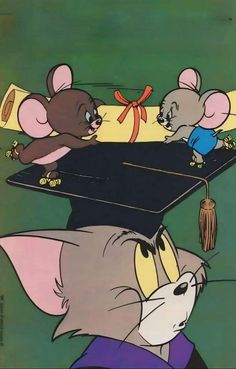 two mouses are on top of a graduation cap