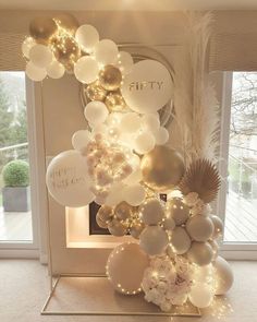 balloons and lights decorate the entrance to a party