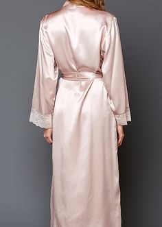 You called for luxury? This luscious, full-length 100% silk robe will have you feeling pampered and cherished as soon as you wrap it around you.  With an elegant banded collar and delicate, airy lace trim at the cuffs, we didn’t leave out our usual must-have details like side seam pockets, inside ties for security, and a gorgeous detachable sash. With the selection of beautiful matching nightgowns and camisoles, this gorgeous silk robe will turn every day into an extraordinary one. Long Silk Robe For Wedding Night, Elegant Open Front Kimono For Wedding, Elegant Long Wedding Night Robe, Elegant Long Kimono With Lace Trim, Elegant Long Lace Trim Kimono, Elegant Silk Robe For Wedding Night, Elegant Wedding Robe With Lace Cuffs, Elegant Open Front Wedding Robe, Elegant Wrap Wedding Night Robe