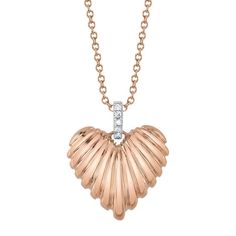 Introducing a symphony of elegance: our 0.02ct Round Brilliant Cut Diamond Fluted Heart Necklace, meticulously fashioned in modern 14k Rose Gold. Setting itself apart with its distinct design, this necklace boasts diamonds adorning the bail, while the heart flaunts a captivating convex silhouette, adding depth and allure to the design. Elevate your style with this exceptional necklace, a testament to love and individuality. Luxury Rose Gold Heart Necklace For Anniversary, Rose Gold Diamond Heart Pendant Necklace, Rose Gold Heart Pendant Diamond Necklace, Elegant Rose Gold Diamond Cut Heart Necklace, Elegant Rose Gold Heart Necklace With Diamond Cut, Rose Gold Heart Cut Diamond Necklace With Accents, Rose Gold Heart Necklace With Diamond Accents, Luxury Rose Gold Heart Necklace, Rose Gold Heart-shaped Diamond Necklace