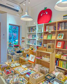 the children's book store has many books on shelves