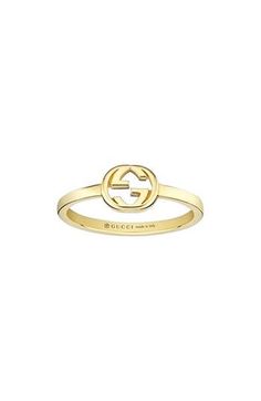 The recognizable GG-logo centers this 18-karat-gold ring that's perfect for stacking. 1/4" pendent; 1/8" band 18k gold Made in Italy Gucci Ring Gold, Gucci Designer Rings In 14k Gold, Classic Gucci Engraved White Gold Ring, Gucci 14k Gold Designer Rings, Designer Gucci 14k Gold Rings, Gucci White Gold Ring In Fine Jewelry Style, Gucci Fine Jewelry White Gold Rings, Gucci White Gold Fine Jewelry Ring, Classic Gucci Engraved Ring For Anniversary