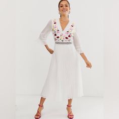 Nwot W’s Asos Design Lace Insert Pleated Midi Dress With Embroidery Sz 12 White V-neck Dress With Floral Embroidery, V-neck Dresses With Embroidered Hem For Brunch, Spring V-neck Midi Dress With Embroidered Hem, White Embroidered Spring Party Dress, Spring Wedding Dress With Embroidered Hem, White Embroidered Midi Dress For Spring, Elegant White Embroidered Dress With Hem Detail, Elegant White Dress With Embroidered Hem, White Midi Dress With Embroidered Hem For Summer