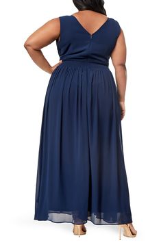 A flowy skirt and pleated bodice add graceful charm to this sleeveless maxi dress with an alluring V-neck. 60'' length (size 2X) V-neck Sleeveless Back zip closure 100% polyester shell/lining Machine wash Imported Model stats: 5'10" height, 41" bust, 36" waist, 48" hip. Model is wearing size 2X. Chiffon A-line Maxi Dress With Pleated Bodice, Flowy V-neck Chiffon Maxi Dress, Flowy Chiffon V-neck Maxi Dress, Flowy Chiffon Maxi Dress With V-neck, Elegant Pleated Flowy Maxi Skirt, Chiffon V-neck Pleated Maxi Dress, Chiffon Maxi Dress With Pleated Bodice And V-neck, Sleeveless Maxi Dress With Pleated Back For Bridesmaids, Long Dresses With Pleated Waist And Flowy Skirt