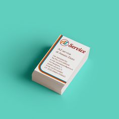 a business card on a turquoise background with the word service written in orange and white