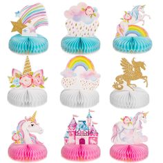 paper plates with unicorns, castle and rainbow decorations on top of each cake plate