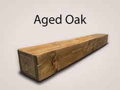 a wooden beam with the words aged oak on it