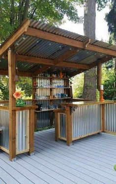 an outdoor bar is built into the deck