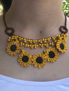 Handmade Bohemian Sunflower Necklace, Turkish Needle Lace Jewelry, Mom Gifts, Traditional Oya ❤️ Beaded Sunflower Necklace is special for women. You can wear this handmade necklace every day. The sunflower necklace will definitely add a stylish finishing touch to your look. You can choose this handmade necklace as a birthday gift or anniversary gift for your mother, wife or girlfriend. If they like beaded jewelry and needlework, this unique handmade necklace is a perfect choice for them. 🎁 Uniq Summer Flower Shaped Beaded Necklaces, Bohemian Brown Flower Necklace, Bohemian Flower Necklace For Summer, Yellow Flower-shaped Beaded Necklaces, Bohemian Flower Necklace For Beach, Bohemian Sunflower Design Jewelry For Summer, Bohemian Summer Jewelry With Sunflower Design, Yellow Flower-shaped Beaded Necklace, Bohemian Beach Flower Necklace